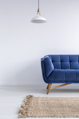 Home interior with blue sofa