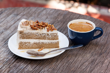 Coffee cake with almond and hot espresso