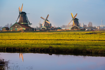 Naklejka premium Old windmill in the winter. Village Zaanse Schans, Netherlands