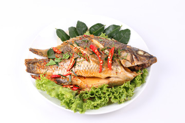 Curry-fried Tilapia fish with spicy topping.