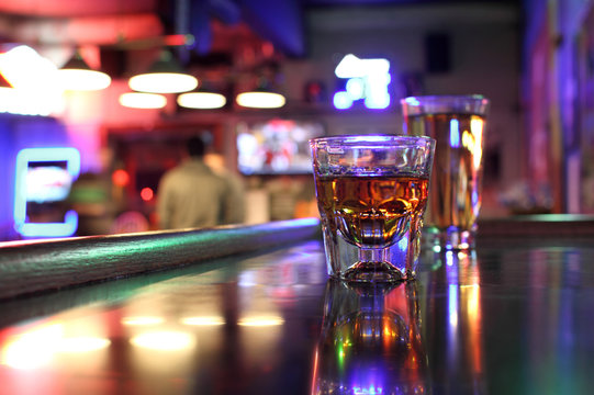 Whiskey and beer at a bar