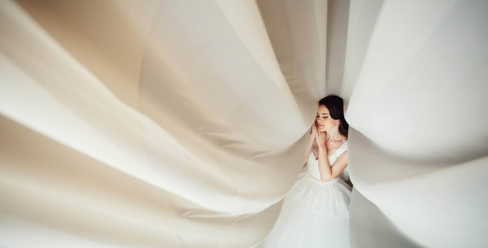nice portrait of incredibly beautiful bride in the morning