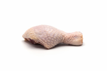 Raw chicken drumstick isolated on white