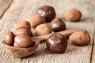 Chocolate balls and wooden spoon
