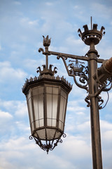 Fototapeta na wymiar Street Lamp with Ornament showing Ship, Lisbon, Portugal, Europe