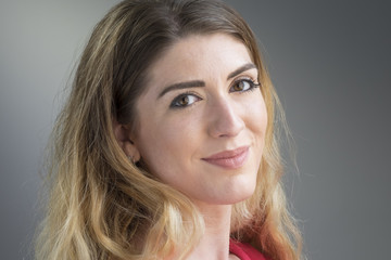 Fototapeta premium Portrait of a young woman smiling