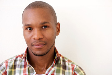 Obraz premium young african american man against white background