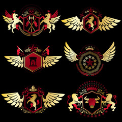 Naklejka premium Vintage decorative heraldic vector emblems composed with element