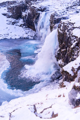 Fototapeta na wymiar The frozen Kirkjufell waterfall in winter. Iceland