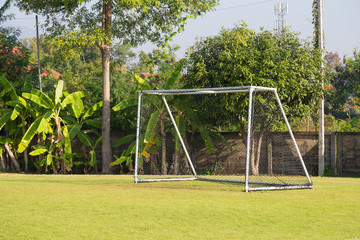 empty soccer or football goal in a school soccer field