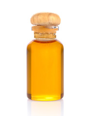  oil in bottle over white background