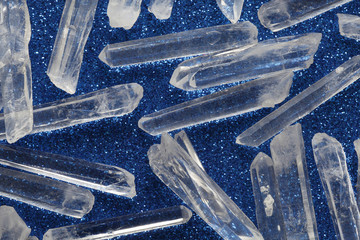 Terminated clear crystal quartz wands - a random scattered selection of clear mini terminated...