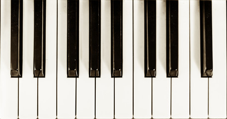 Naklejka premium Close up view of piano keys