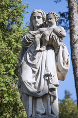 antique statue of the Virgin Mary with the baby Jesus Christ