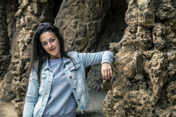 Portrait of young and attractive woman with long brown hair in P