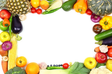 Fresh vegetables and fruits on white background