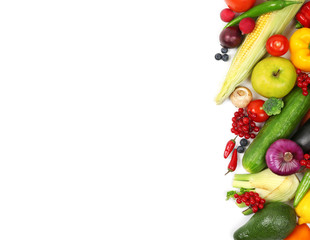 Fresh vegetables and fruits on white background