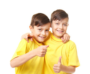 Twin brothers on white background