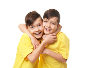 Twin brothers on white background