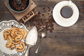 cup with coffee and coffee beans in vintage style