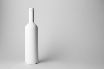 Wine Bottle is standing on gray background