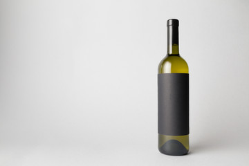 Wine Bottle is standing on gray background