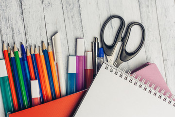 stationery on a wooden background