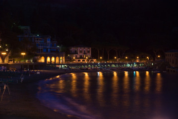 Fototapeta na wymiar Illuminated city beach in Cinque terre region