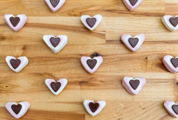 Flat lay candy hearts for Valentines day.