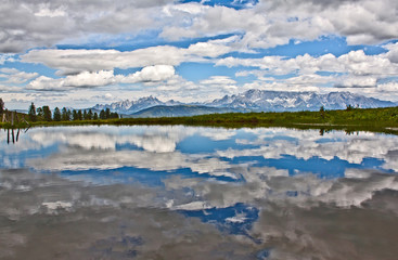 Ein Wolkenspiel in der Lacke