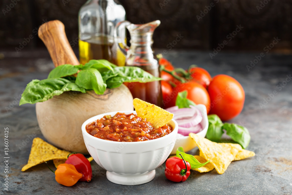 Wall mural homemade spicy tomato salsa with vegetables and olive oil - Wall murals