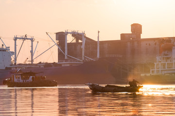 Morning view of the Chao Phraya River With boats. Bangkok, Thailand.
