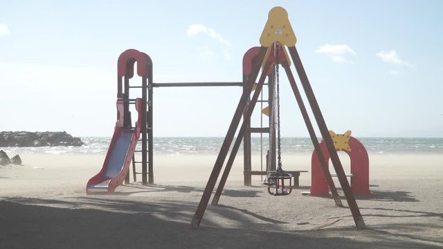 Columpio juego playa viento