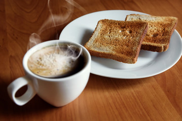 Hot coffee and fresh toast. Morning breakfast.