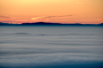 Sunrise over a sea of fog