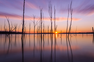 Fototapeta na wymiar Long exposure sunrise at Manasquan Reservoir in New Jersey 