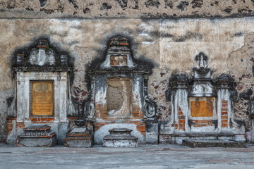 Burials on the outer facade of the Catholic church in Cholula, M