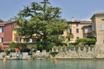 Fototapeta na wymiar Houses at the lakeside in Sirmione, Italy