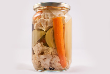 Jar with pickled vegetables