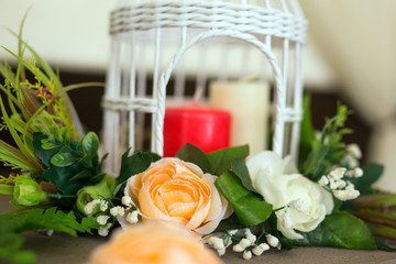 Wedding ceremony. Wedding decoration in a rustic style. Iron box with roses. Decorated with a fireplace