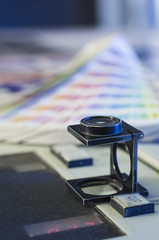 Color management in printing process with magnifying glass and c