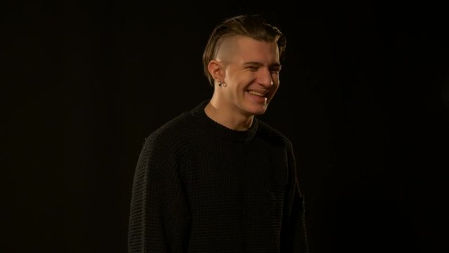 Man laughing in the studio