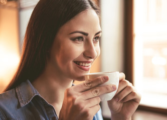 Beautiful girl at the cafe