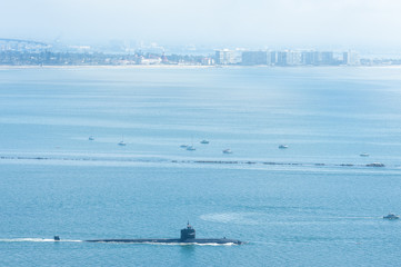 Obraz premium American submarine leaving naval base in San Diego harbor, California 