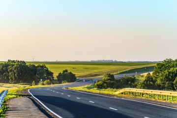 Fototapeta premium Turn countryside asphalt road with marking. Belgorod region, Russia.