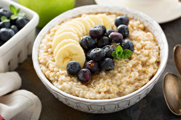 Steel cut oatmeal porridge with banana and blueberry