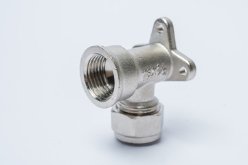 Brass fitting for connecting metal-plastic pipes isolated on whi