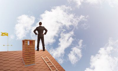 Mister boss on brick roof with arms akimbo. Mixed media