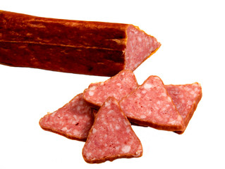 Salami smoked sausage slices isolated on white background cutout