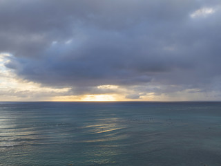 Naklejka na ściany i meble Sunset over the ocean in Oahu, Hawaii
